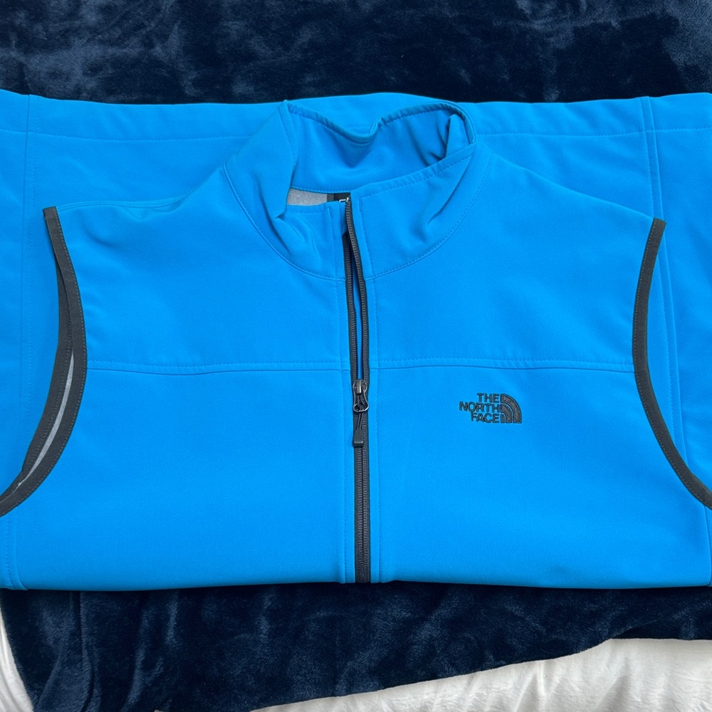 The North Face Vibrant Blue Sleeveless full zip Jacket